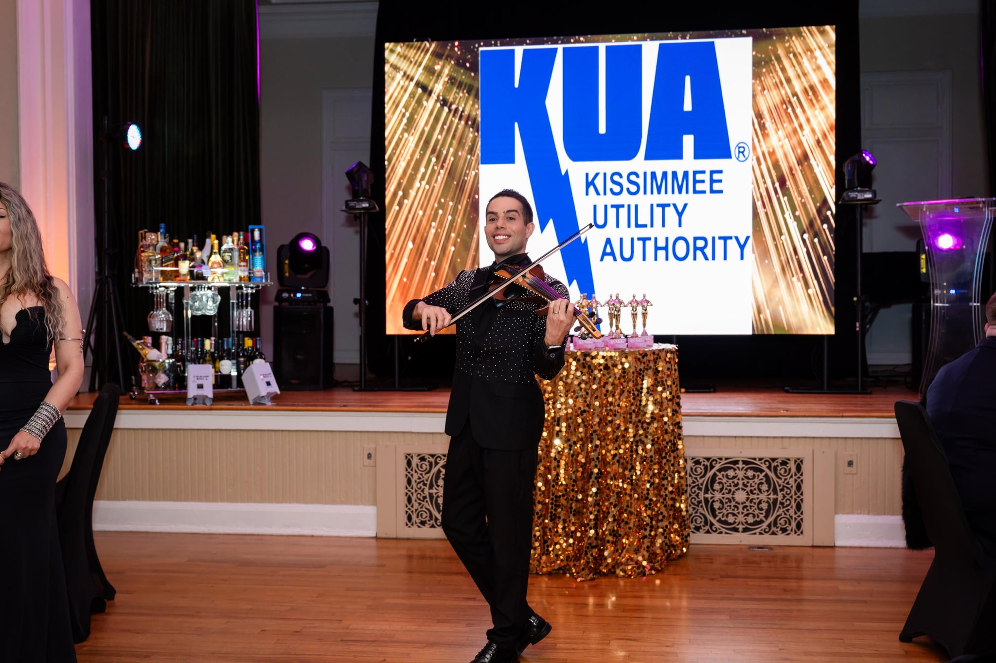 David Chirinos performing at a corporate gala for Kissimmee Utility Authority